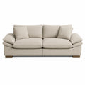 Divano a 3 posti in tessuto beige con cuscini