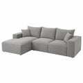Divano angolare in tessuto grigio con chaise longue